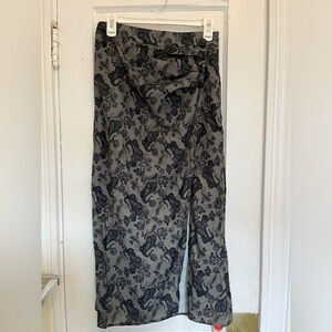 High waist green patterned skirt with slit and button detail (zipper on side)